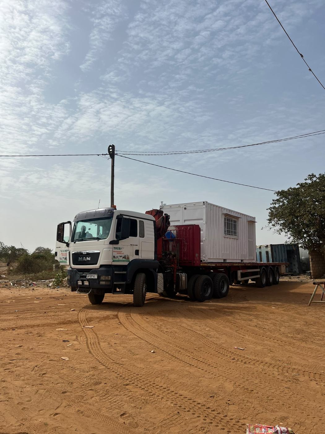 Livraison camion-grue